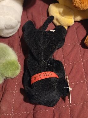 Black Plush Dog with Red Collar